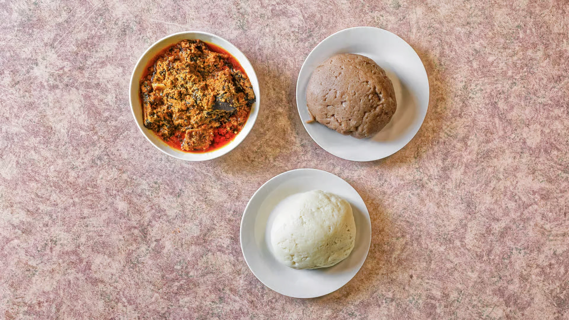 Egusi Soup with Poundo - Rich West African soup at The Tantalizers African House Edmonton